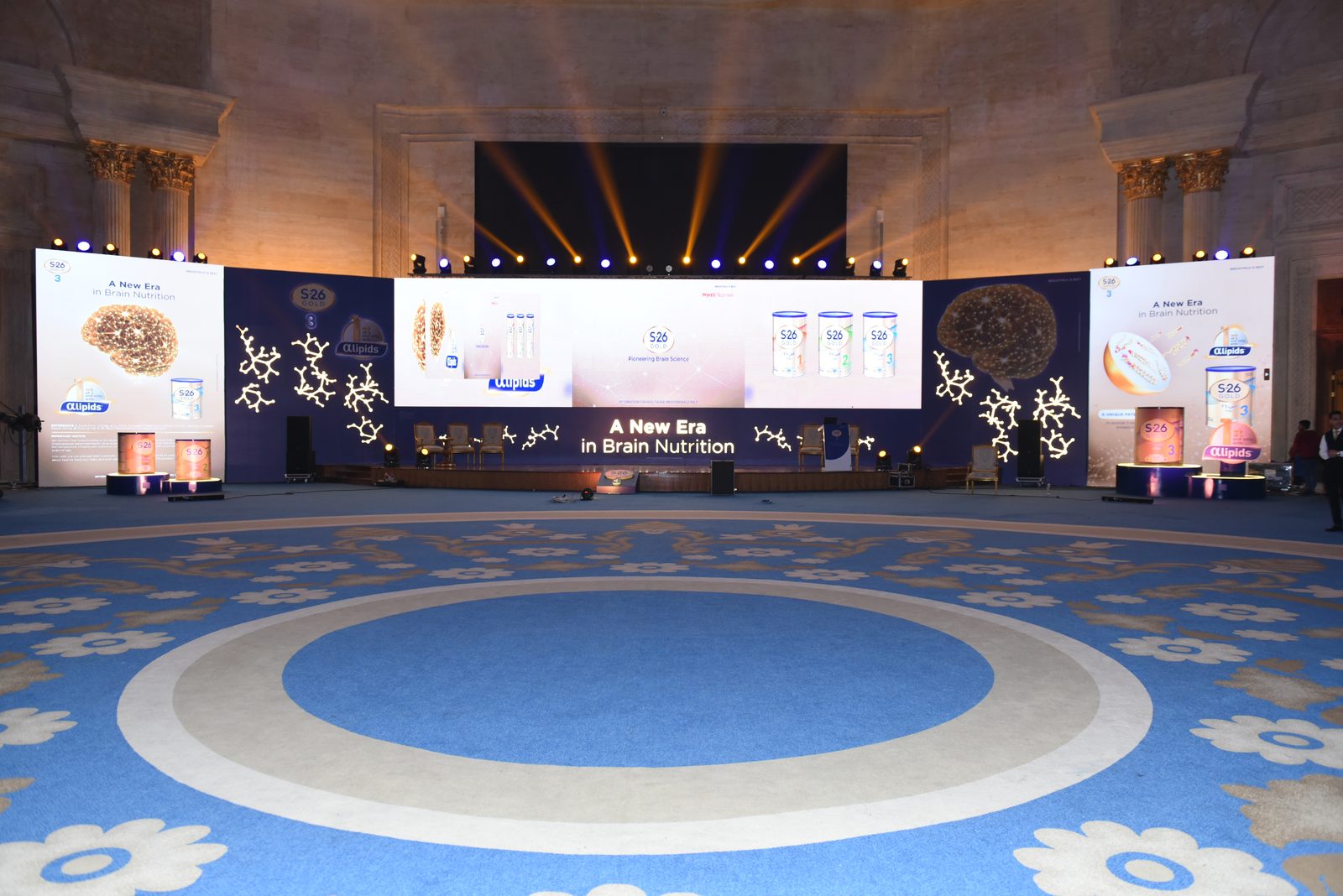 Ballroom stage with wide LED backdrop and theatrical lighting by Top-Tech